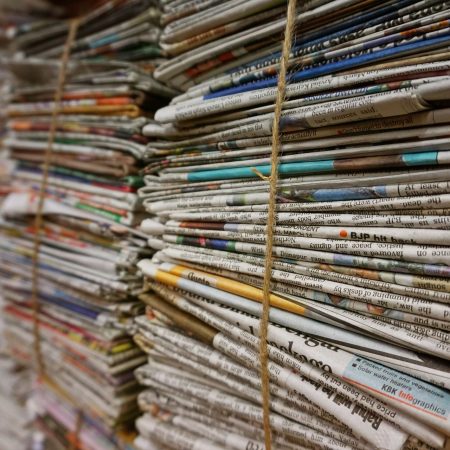 Stack of newspapers.